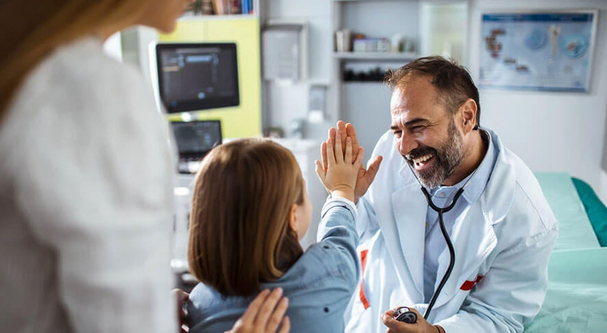 Doctor giving patient a high five